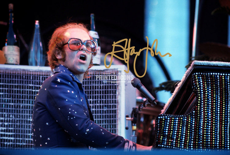 Signed (printed photo) of Elton John. A printed autograph taken from a genuine, certified (certificate of authenticity) autograph. A stunning signature. The print is available in a range of sizes with various framing options available. 