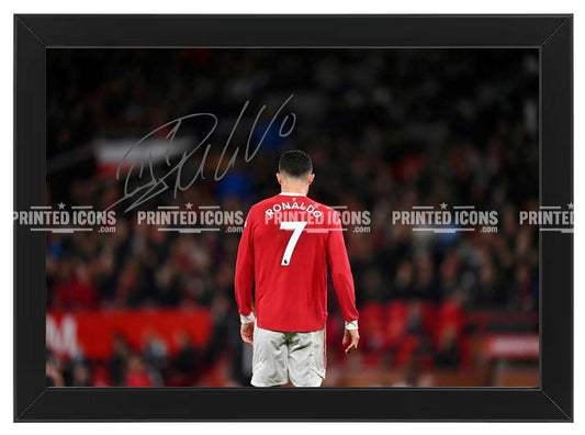 Signed (printed photo) of  Cristiano Ronaldo playing for Manchester United. A printed autograph taken from a genuine, certified (certificate of authenticity) autograph. A stunning signature. The print is available in a range of sizes with various framing options available. Cristiano Ronaldo is the all time GOAT, having played for Real Madrid, Juventus and Al-Nassr. He is also an icon for Portugal.
