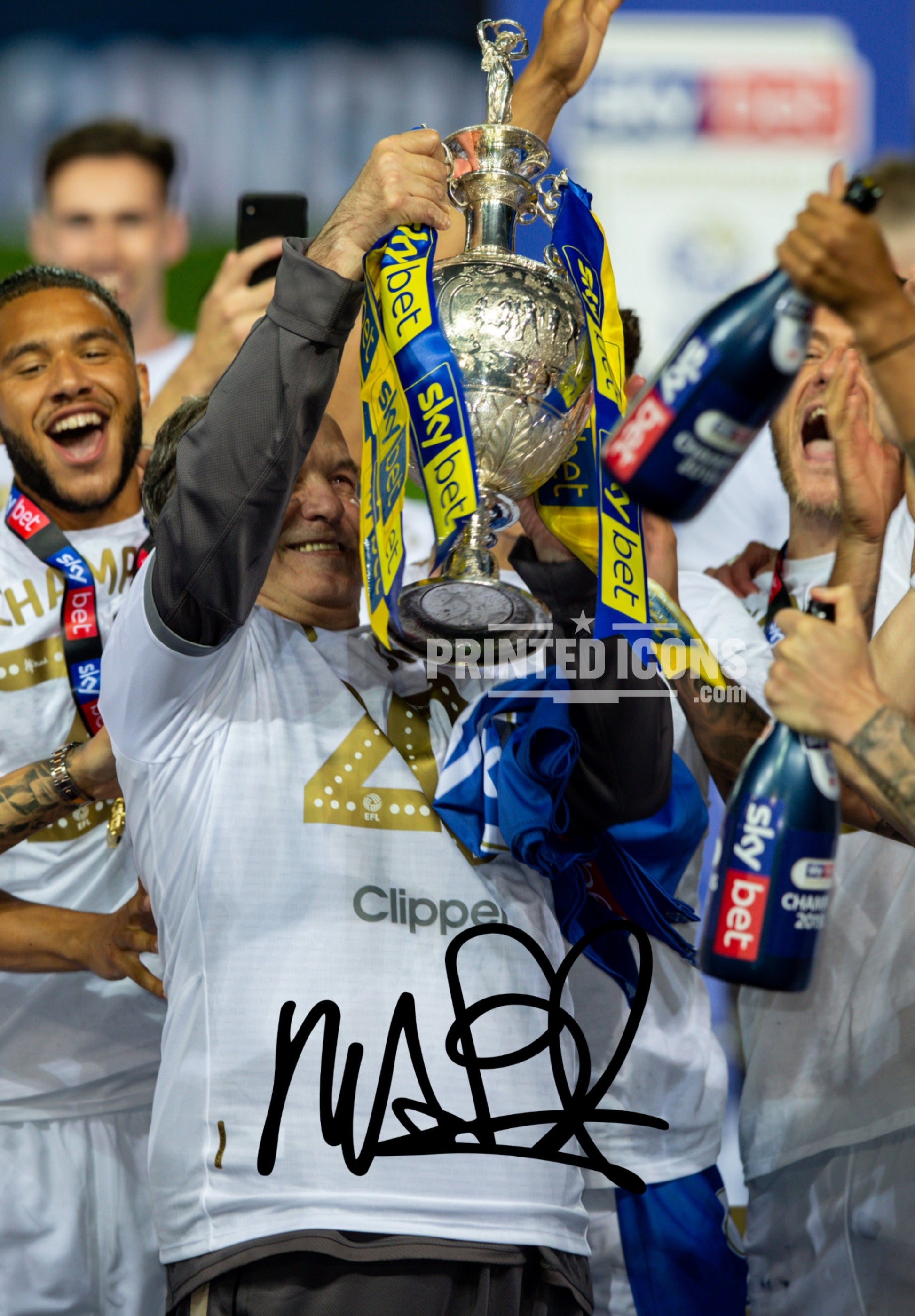 Signed (printed photo) of Marcelo Bielsa managing Leeds United. He is lifting the 2020 Championship trophy. A printed autograph taken from a genuine, certified (certificate of authenticity) autograph. A stunning signature. The print is available in a range of sizes with various framing options available.  Marcelo Bielsa is famous for sitting on his iconic blue bucket. 