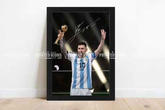 Signed (printed photo) of Lionel Messi playing for Argentina during the 2022 World Cup. He is holding the 2022 World Cup. A printed autograph taken from a genuine, certified (certificate of authenticity) autograph. A stunning signature. The print is available in a range of sizes with various framing options available.  Lionel Messi currently plays for Inter Miami but has previously played for Barcelona and PSG.