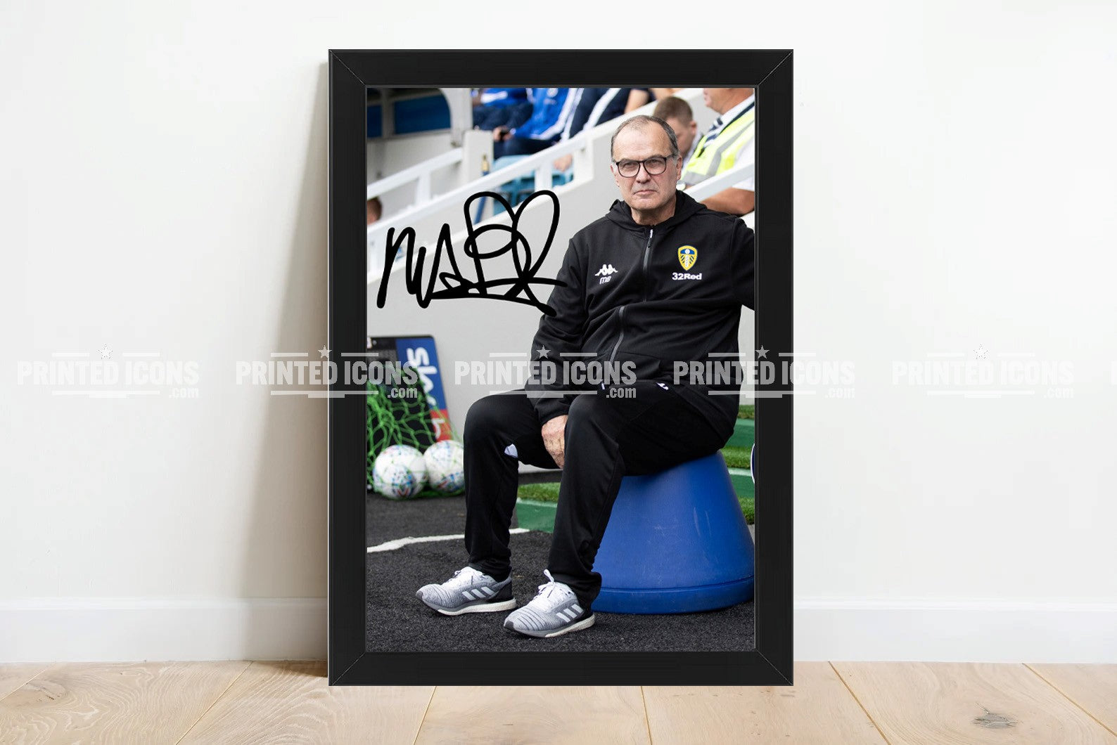 Signed (printed photo) of Marcelo Bielsa managing Leeds United. He is sitting on his iconic blue bucket. A printed autograph taken from a genuine, certified (certificate of authenticity) autograph. A stunning signature. The print is available in a range of sizes with various framing options available.  Marcelo Bielsa is famous for sitting on his iconic blue bucket. 