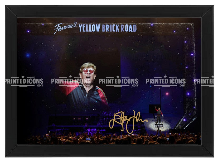 Signed (printed photo) of Elton John. A printed autograph taken from a genuine, certified (certificate of authenticity) autograph. A stunning signature. The print is available in a range of sizes with various framing options available. Yellow Brick Road final tour.