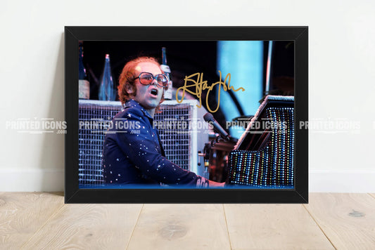 Signed (printed photo) of Elton John. A printed autograph taken from a genuine, certified (certificate of authenticity) autograph. A stunning signature. The print is available in a range of sizes with various framing options available. 