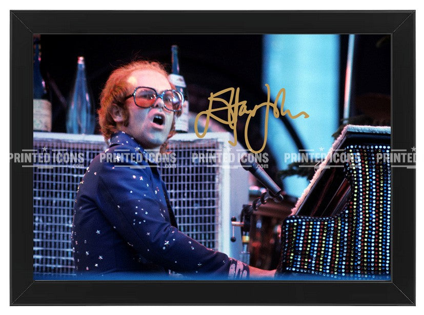 Signed (printed photo) of Elton John. A printed autograph taken from a genuine, certified (certificate of authenticity) autograph. A stunning signature. The print is available in a range of sizes with various framing options available. 