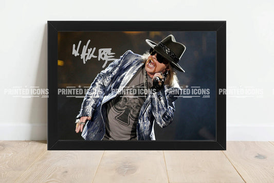 Signed (printed photo) of Guns N Roses. Printed signatures of Axl Rose. A printed autograph taken from a genuine, certified (certificate of authenticity) autograph. A stunning signature. The print is available in a range of sizes with various framing options available. 