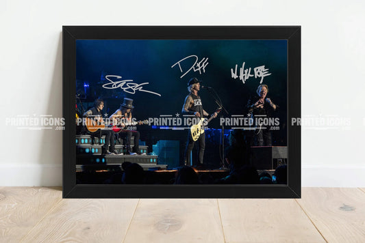 Signed (printed photo) of Guns N Roses. Printed signatures of Slash, Axl Rose and Duff McKagan. A printed autograph taken from a genuine, certified (certificate of authenticity) autograph. A stunning signature. The print is available in a range of sizes with various framing options available. 