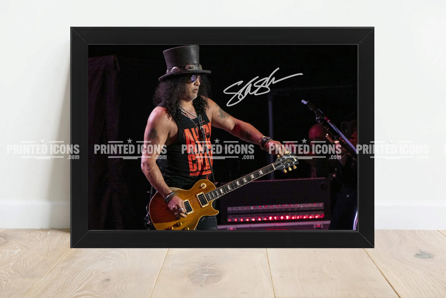 Signed (printed photo) of Guns N Roses. Printed signature of Slash. A printed autograph taken from a genuine, certified (certificate of authenticity) autograph. A stunning signature. The print is available in a range of sizes with various framing options available. 