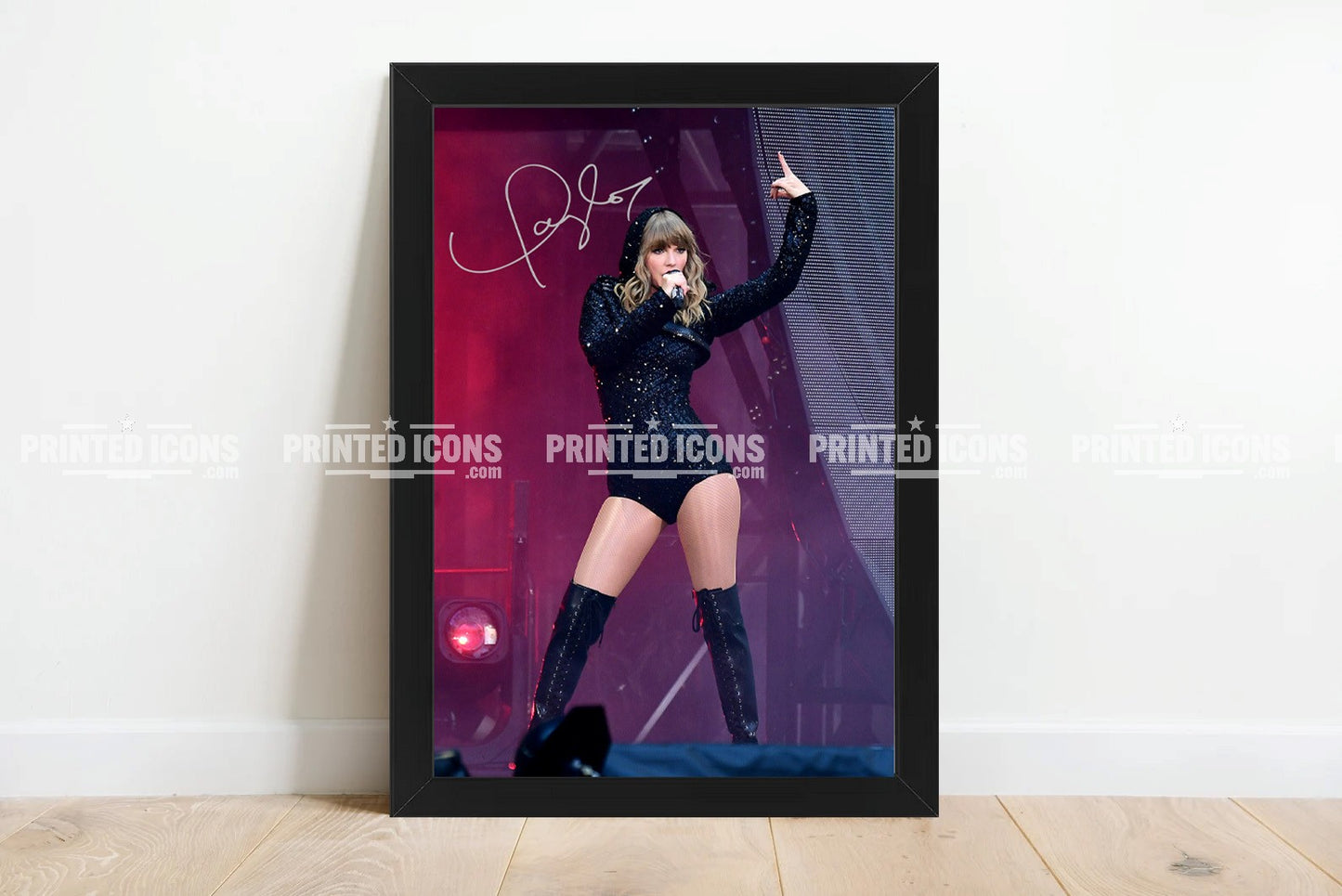 Signed (printed photo) of Taylor Swift from  her Eras Tour. A printed autograph taken from a genuine, certified (certificate of authenticity) Taylor Swift autograph. A stunning signature. The print is available in a range of sizes with various framing options available. 