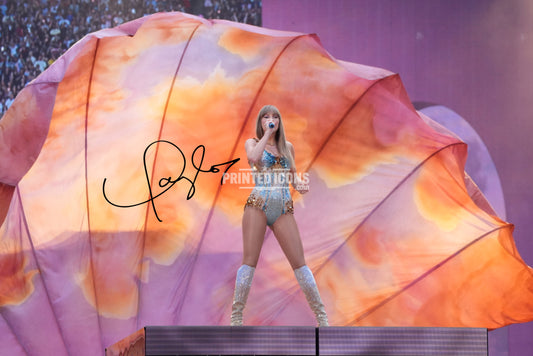 Signed (printed photo) of Taylor Swift from  her Eras Tour. A printed autograph taken from a genuine, certified (certificate of authenticity) Taylor Swift autograph. A stunning signature. The print is available in a range of sizes with various framing options available. 