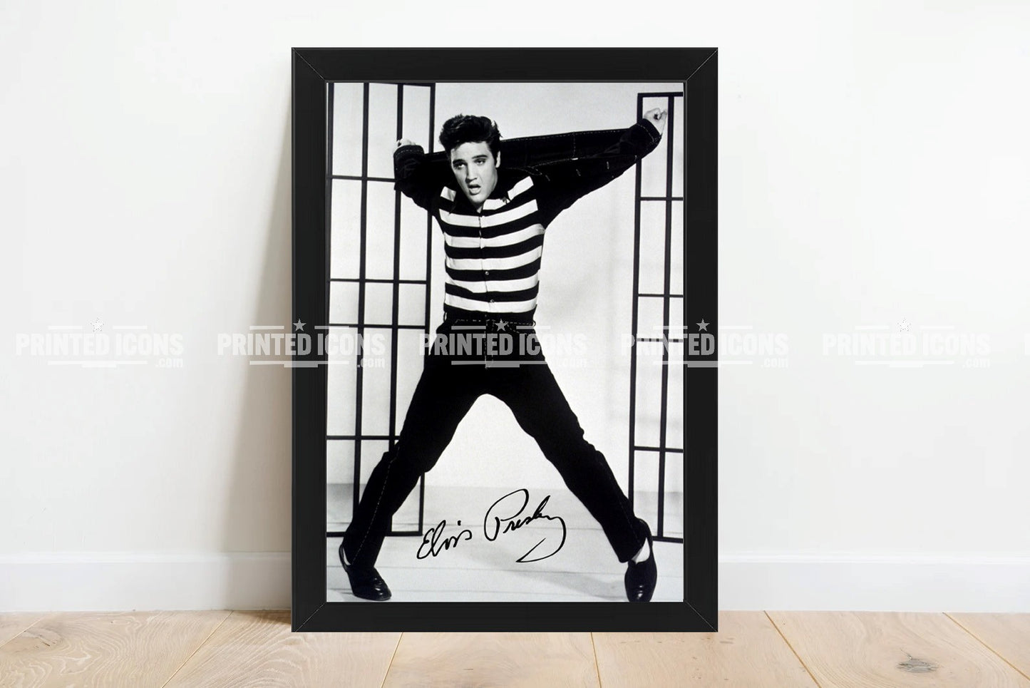 Signed (printed photo) of Elvis Presley, the King of Rock n' Roll. Taken from the film Jailhouse Rock. A printed autograph taken from a genuine, certified (certificate of authenticity) Elvis Presley autograph. A stunning signature. The print is available in a range of sizes with various framing options available. 
Jailhouse Rock Print