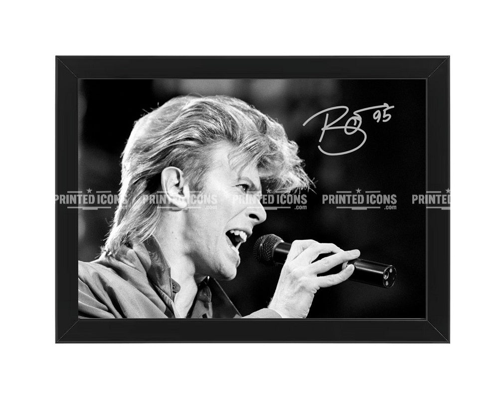 Signed (printed photo) of David Bowie. A printed autograph taken from a genuine, certified (certificate of authenticity) David Bowie autograph. A stunning signature. The print is available in a range of sizes with various framing options available.