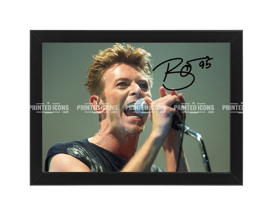 Signed (printed photo) of David Bowie. A printed autograph taken from a genuine, certified (certificate of authenticity) David Bowie autograph. A stunning signature. The print is available in a range of sizes with various framing options available.