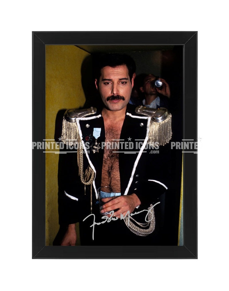 Signed (printed photo) of Freddie Mercury of Queen performing at Live Aid. A printed autograph taken from a genuine, certified (certificate of authenticity)  autograph. A stunning signature. The print is available in a range of sizes with various framing options available. A framed photo version is the perfect gift for any fan.