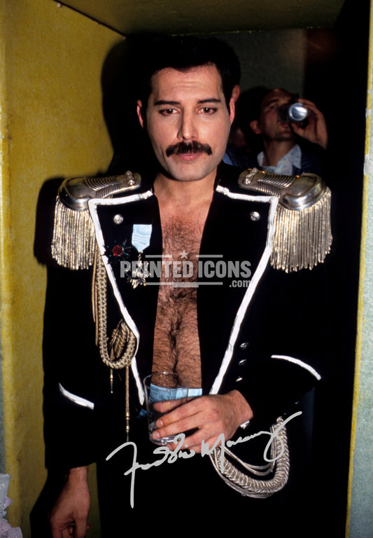 Signed (printed photo) of Freddie Mercury of Queen performing at Live Aid. A printed autograph taken from a genuine, certified (certificate of authenticity)  autograph. A stunning signature. The print is available in a range of sizes with various framing options available. A framed photo version is the perfect gift for any fan.