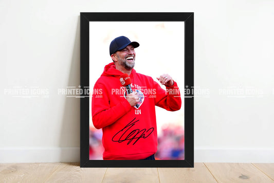 Signed (printed photo) Jurgen Klopp Liverpool. This shows Jurgen during his last game for Liverpool. A printed autograph taken from a genuine, certified (certificate of authenticity)  autograph. A stunning signature. The print is available in a range of sizes with various framing options available. A framed photo version is the perfect gift for any fan.