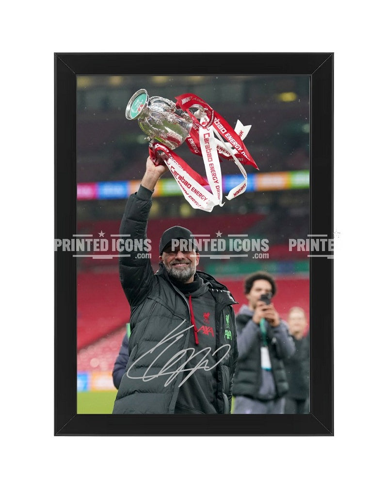 Signed (printed photo) Jurgen Klopp Liverpool. This shows Jurgen during his last game for Liverpool. A printed autograph taken from a genuine, certified (certificate of authenticity)  autograph. A stunning signature. The print is available in a range of sizes with various framing options available. A framed photo version is the perfect gift for any fan.