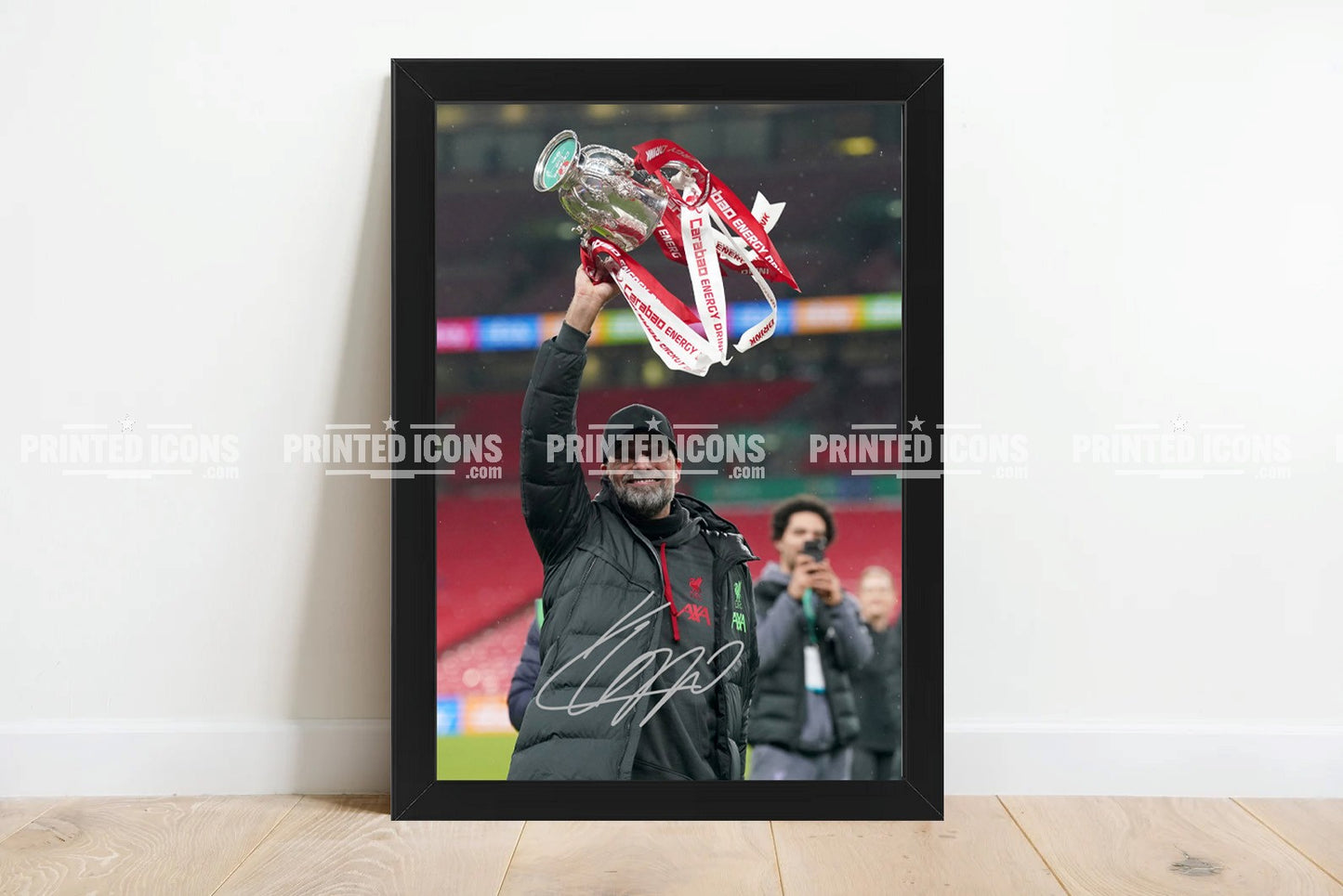 Signed (printed photo) Jurgen Klopp Liverpool. This shows Jurgen during his last game for Liverpool. A printed autograph taken from a genuine, certified (certificate of authenticity)  autograph. A stunning signature. The print is available in a range of sizes with various framing options available. A framed photo version is the perfect gift for any fan.