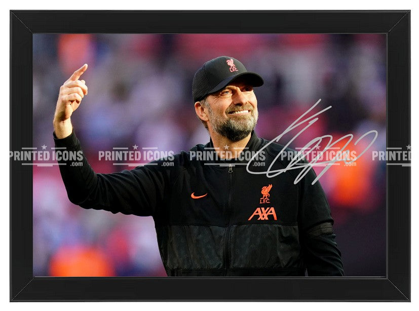 Signed (printed photo) Jurgen Klopp Liverpool. This shows Jurgen during his last game for Liverpool. A printed autograph taken from a genuine, certified (certificate of authenticity)  autograph. A stunning signature. The print is available in a range of sizes with various framing options available. A framed photo version is the perfect gift for any fan.