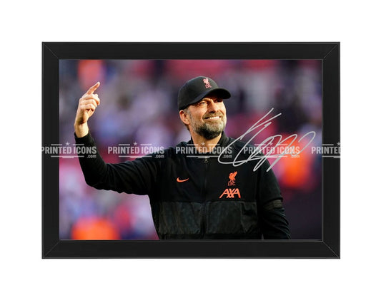 Signed (printed photo) Jurgen Klopp Liverpool. This shows Jurgen during his last game for Liverpool. A printed autograph taken from a genuine, certified (certificate of authenticity)  autograph. A stunning signature. The print is available in a range of sizes with various framing options available. A framed photo version is the perfect gift for any fan.