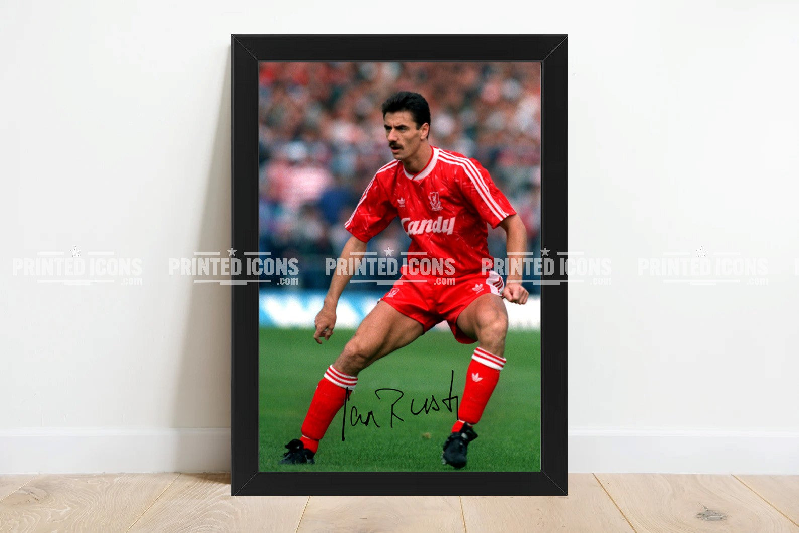 Signed (printed photo) of Ian Rush playing for Liverpool.  A printed autograph taken from a genuine, certified (certificate of authenticity)  autograph. A stunning signature. The print is available in a range of sizes with various framing options available. A framed photo version is the perfect gift for any fan.