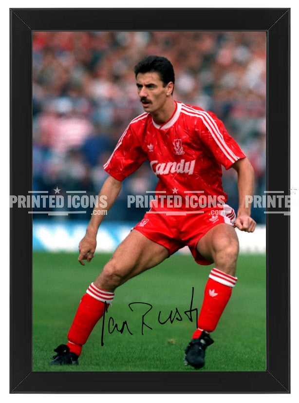 Signed (printed photo) of Ian Rush playing for Liverpool.  A printed autograph taken from a genuine, certified (certificate of authenticity)  autograph. A stunning signature. The print is available in a range of sizes with various framing options available. A framed photo version is the perfect gift for any fan.