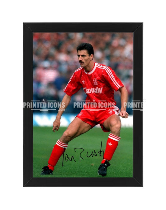 Signed (printed photo) of Ian Rush playing for Liverpool.  A printed autograph taken from a genuine, certified (certificate of authenticity)  autograph. A stunning signature. The print is available in a range of sizes with various framing options available. A framed photo version is the perfect gift for any fan.