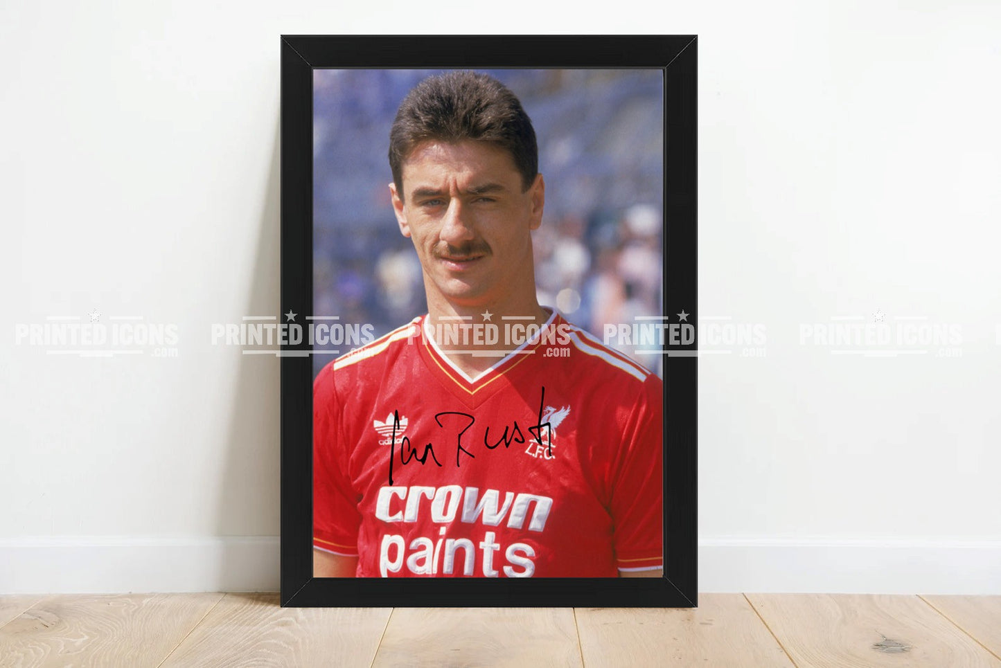 Signed (printed photo) of Ian Rush playing for Liverpool.  A printed autograph taken from a genuine, certified (certificate of authenticity)  autograph. A stunning signature. The print is available in a range of sizes with various framing options available. A framed photo version is the perfect gift for any fan.