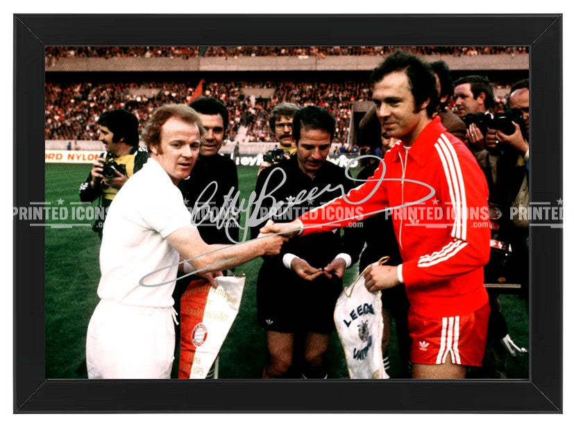 Signed (printed photo) of Billy Bremner and Franz Beckenbauer before the 1975 European Cup Final.  A printed autograph taken from a genuine, certified (certificate of authenticity)  autograph. A stunning signature. The print is available in a range of sizes with various framing options available. A framed photo version is the perfect gift for any fan.