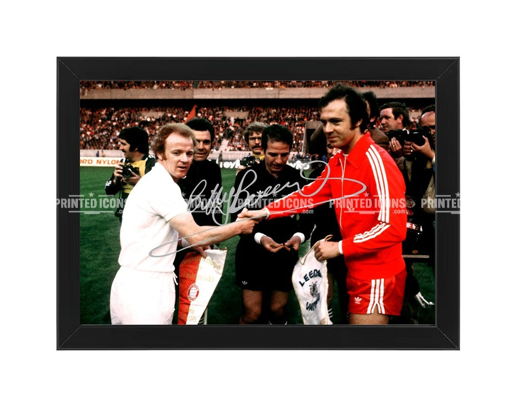 Signed (printed photo) of Billy Bremner and Franz Beckenbauer before the 1975 European Cup Final.  A printed autograph taken from a genuine, certified (certificate of authenticity)  autograph. A stunning signature. The print is available in a range of sizes with various framing options available. A framed photo version is the perfect gift for any fan.