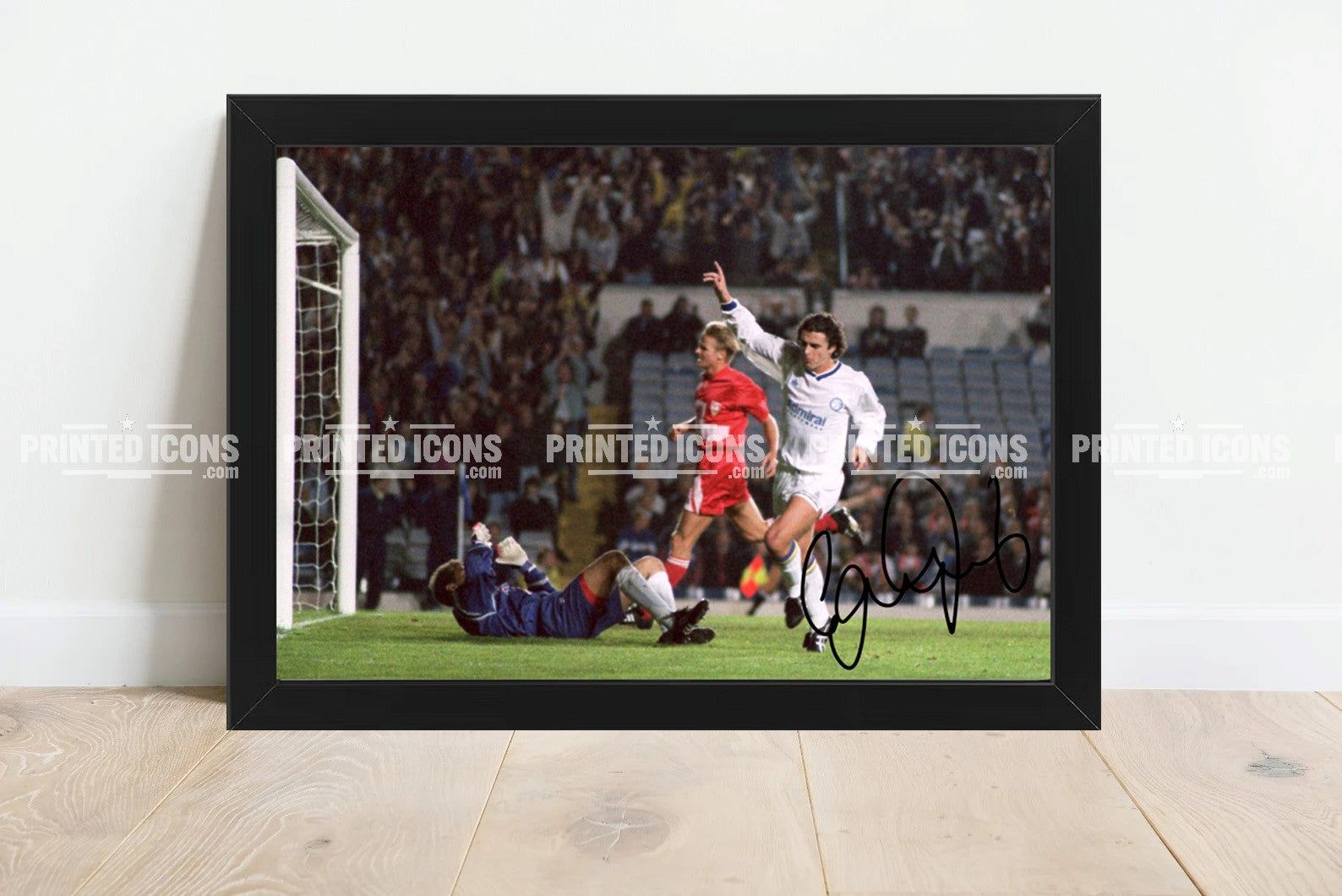 Signed (printed autograph) photo of Gary Speed playing for Leeds United.  A printed autograph taken from a genuine, certified (certificate of authenticity)  autograph. A stunning signature. The print is available in a range of sizes with various framing options available. A framed photo version is the perfect gift for any fan.