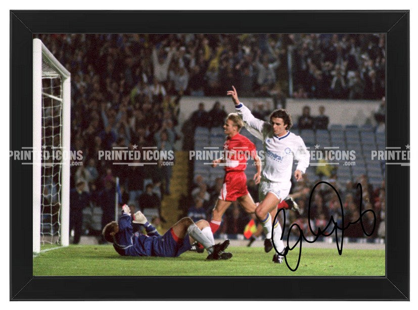 Signed (printed autograph) photo of Gary Speed playing for Leeds United.  A printed autograph taken from a genuine, certified (certificate of authenticity)  autograph. A stunning signature. The print is available in a range of sizes with various framing options available. A framed photo version is the perfect gift for any fan.