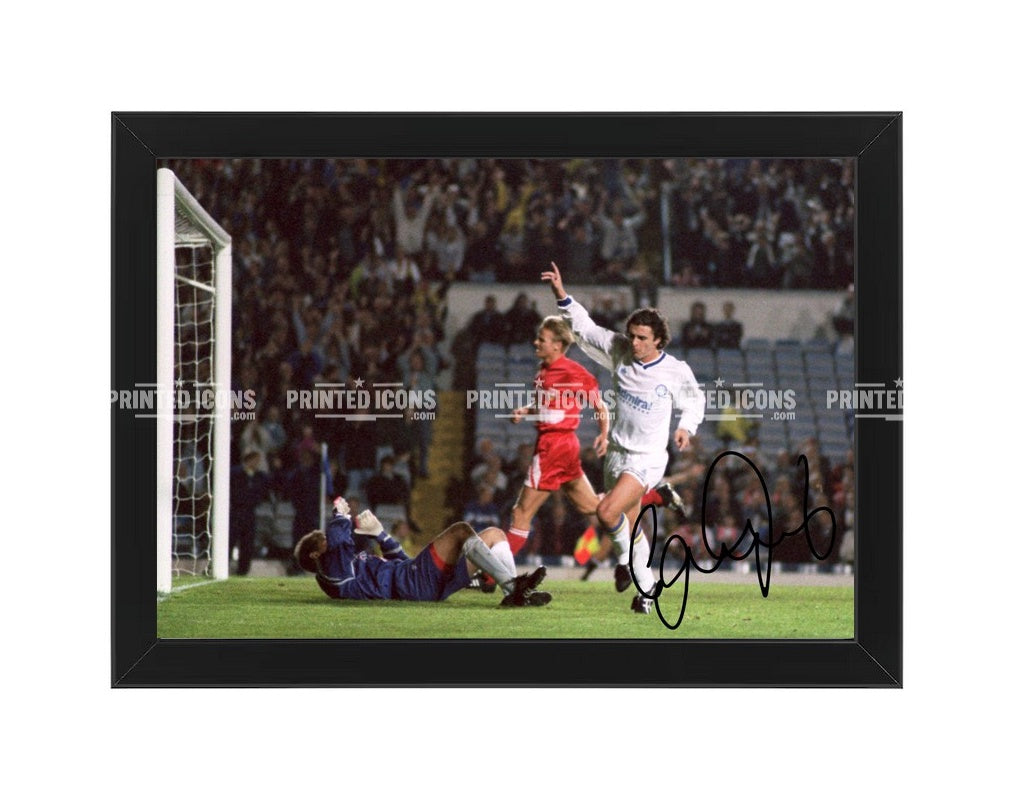 Signed (printed autograph) photo of Gary Speed playing for Leeds United.  A printed autograph taken from a genuine, certified (certificate of authenticity)  autograph. A stunning signature. The print is available in a range of sizes with various framing options available. A framed photo version is the perfect gift for any fan.
