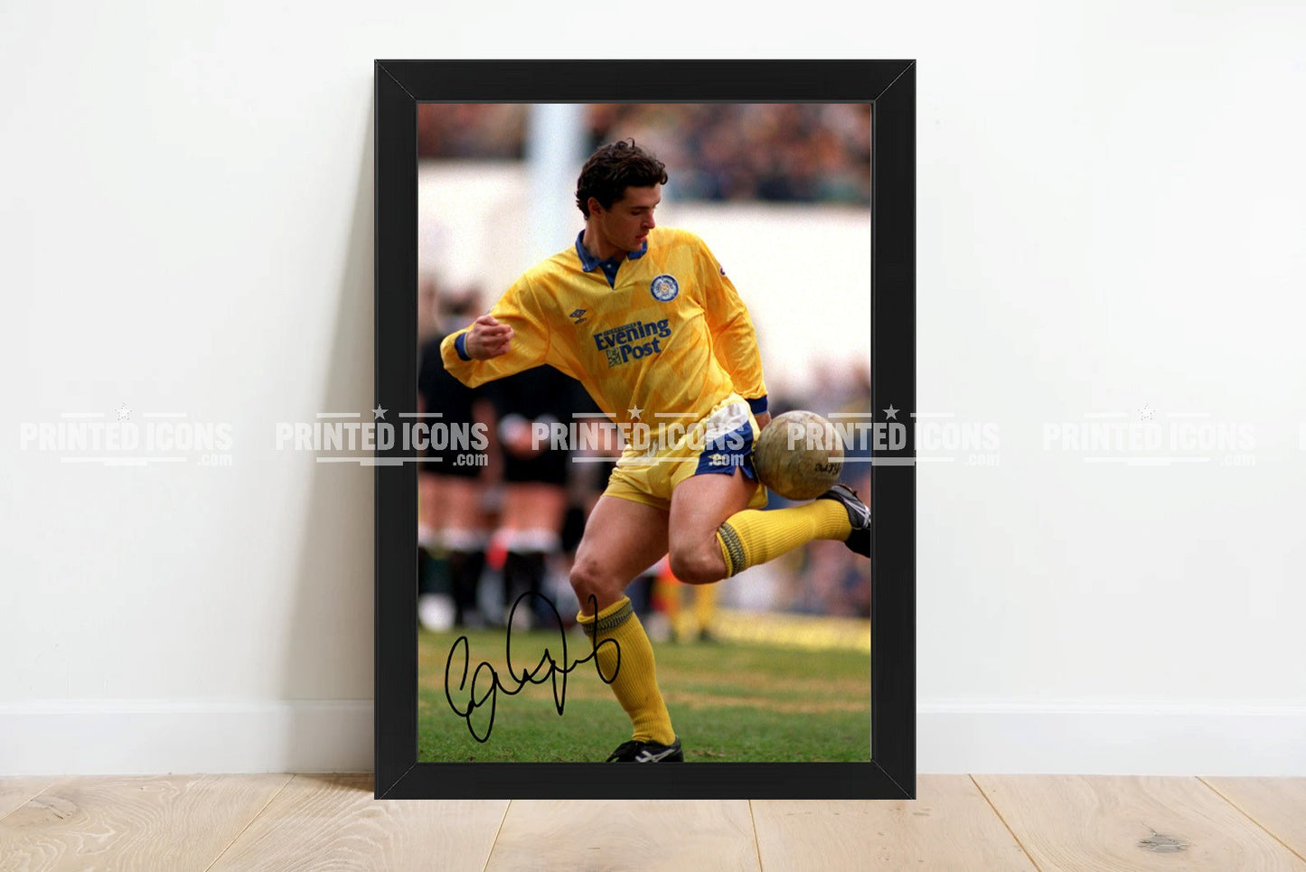 Signed (printed autograph) photo of Gary Speed playing for Leeds United.  A printed autograph taken from a genuine, certified (certificate of authenticity)  autograph. A stunning signature. The print is available in a range of sizes with various framing options available. A framed photo version is the perfect gift for any fan.