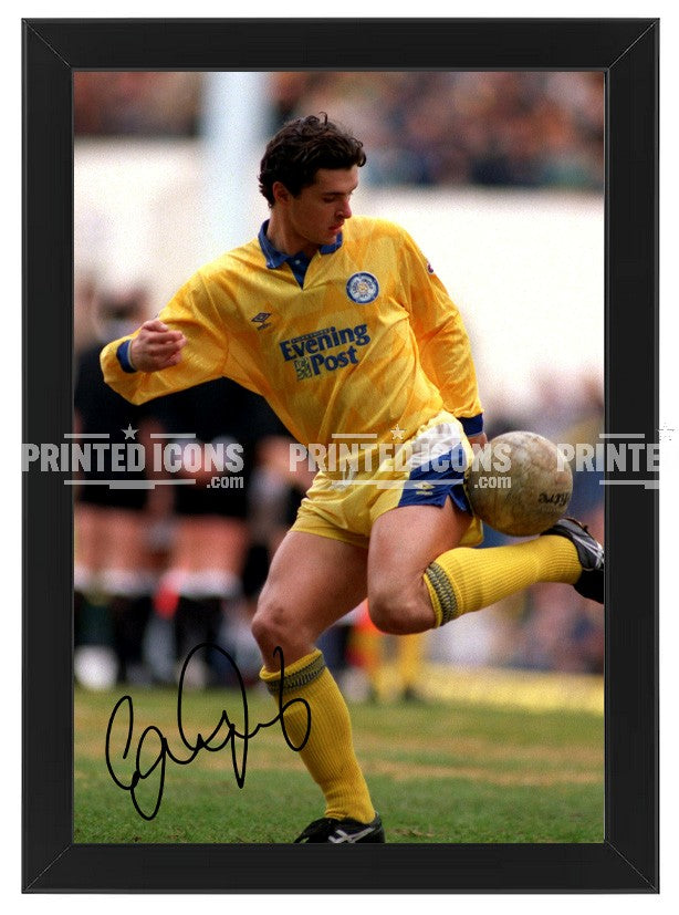 Signed (printed autograph) photo of Gary Speed playing for Leeds United.  A printed autograph taken from a genuine, certified (certificate of authenticity)  autograph. A stunning signature. The print is available in a range of sizes with various framing options available. A framed photo version is the perfect gift for any fan.