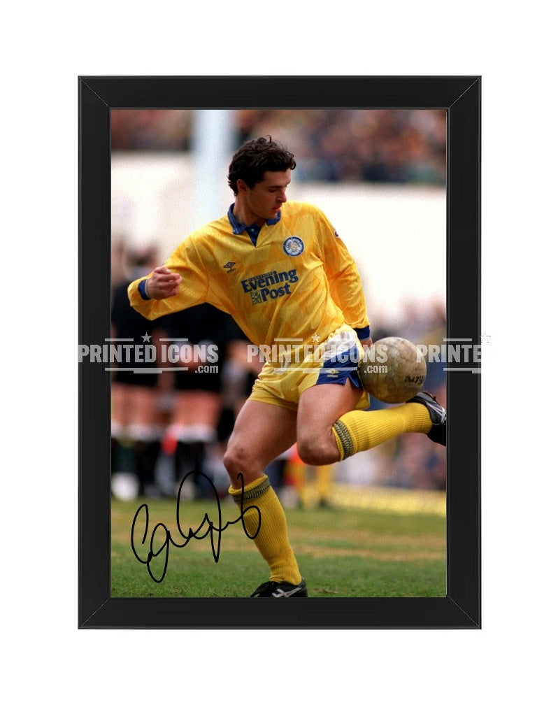 Signed (printed autograph) photo of Gary Speed playing for Leeds United.  A printed autograph taken from a genuine, certified (certificate of authenticity)  autograph. A stunning signature. The print is available in a range of sizes with various framing options available. A framed photo version is the perfect gift for any fan.