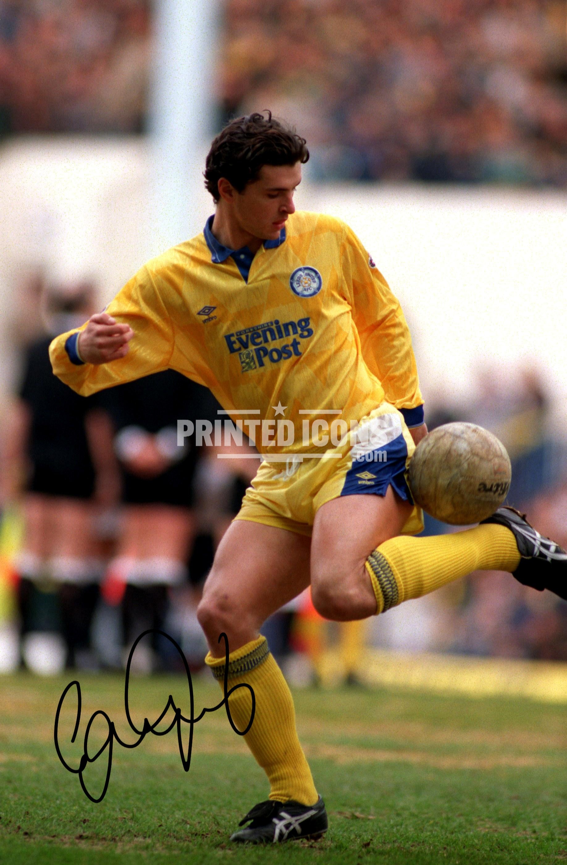 Signed (printed autograph) photo of Gary Speed playing for Leeds United.  A printed autograph taken from a genuine, certified (certificate of authenticity)  autograph. A stunning signature. The print is available in a range of sizes with various framing options available. A framed photo version is the perfect gift for any fan.