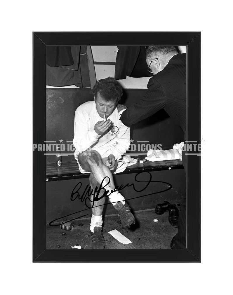 Billy Bremner signed Leeds United photo. The image shows Billy smoking in the changing rooms. A printed autograph (from a certified original) on a Leeds United photo. Framing Available. A great gift for a Leeds United fan.