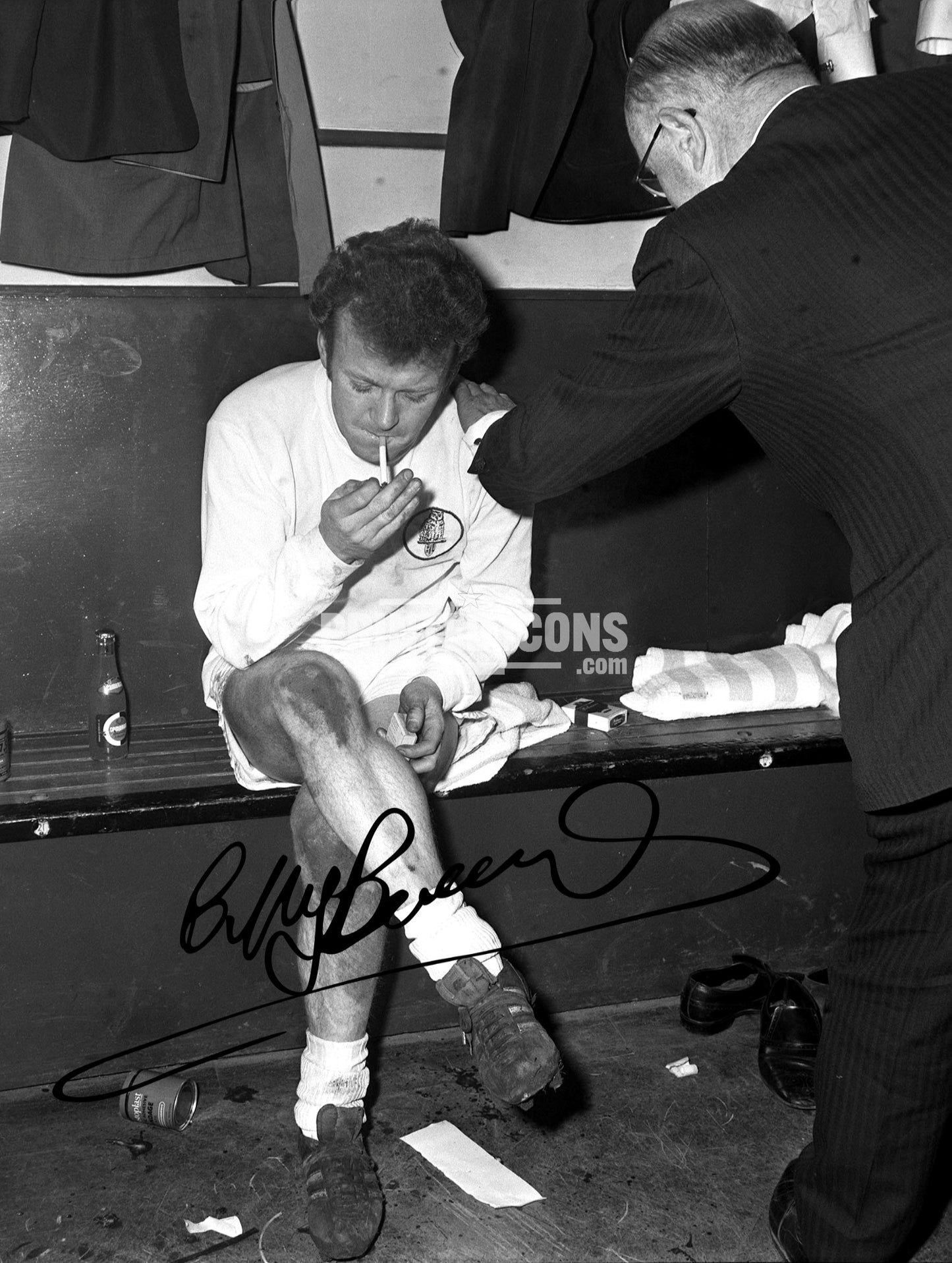 Billy Bremner signed Leeds United photo. The image shows Billy smoking in the changing rooms. A printed autograph (from a certified original) on a Leeds United photo. Framing Available. A great gift for a Leeds United fan.
