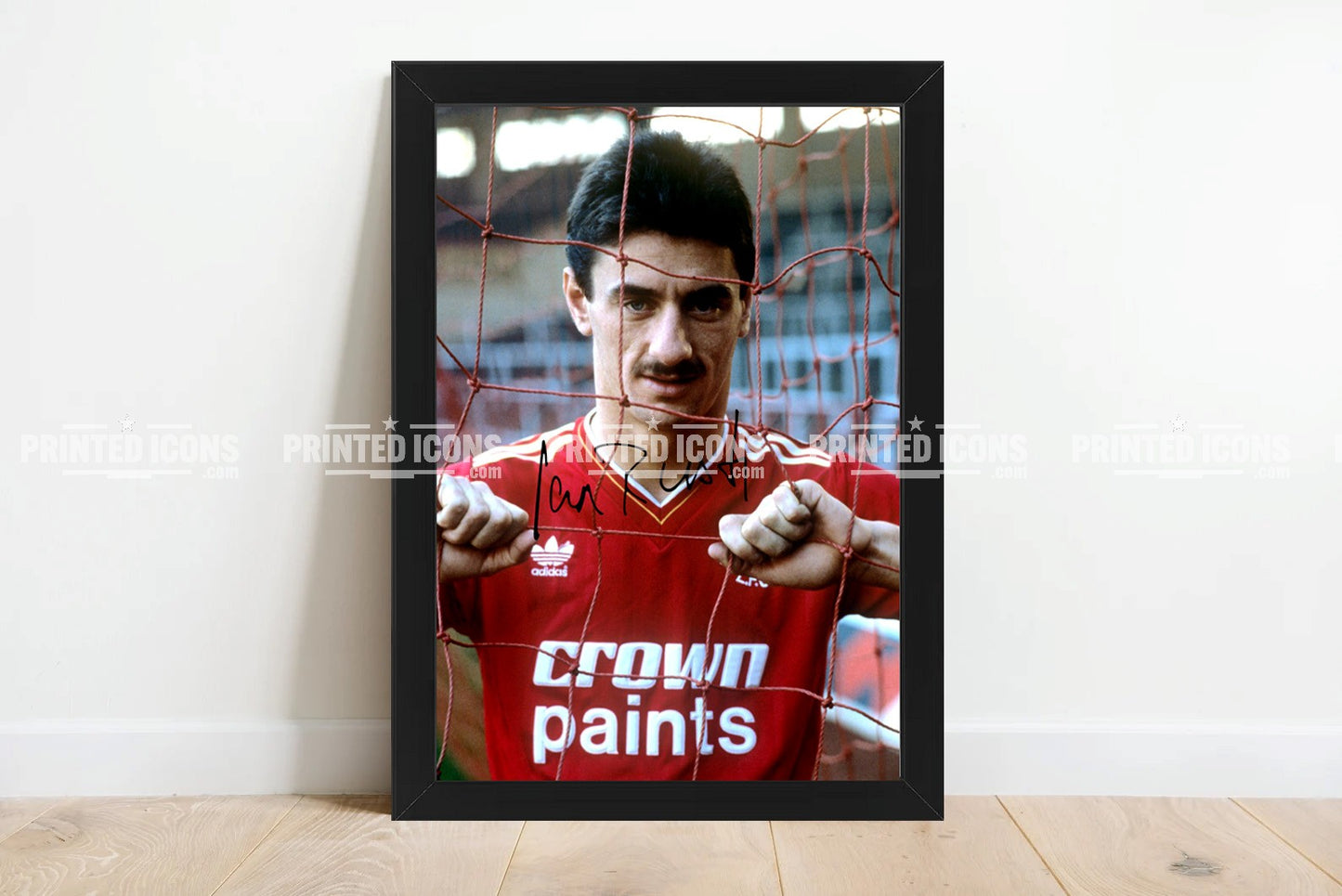 Signed (printed photo) of Ian Rush playing for Liverpool.  A printed autograph taken from a genuine, certified (certificate of authenticity)  autograph. A stunning signature. The print is available in a range of sizes with various framing options available. A framed photo version is the perfect gift for any fan.