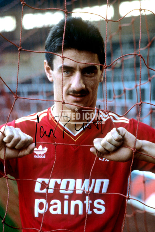 Signed (printed photo) of Ian Rush playing for Liverpool.  A printed autograph taken from a genuine, certified (certificate of authenticity)  autograph. A stunning signature. The print is available in a range of sizes with various framing options available. A framed photo version is the perfect gift for any fan.