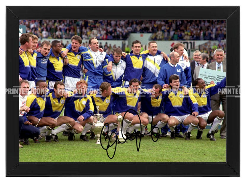 Signed (printed autograph) photo of Gary Speed holding the 1992 First Division Champions trophy for Leeds United.  A printed autograph taken from a genuine, certified (certificate of authenticity)  autograph. A stunning signature. The print is available in a range of sizes with various framing options available. A framed photo version is the perfect gift for any fan.