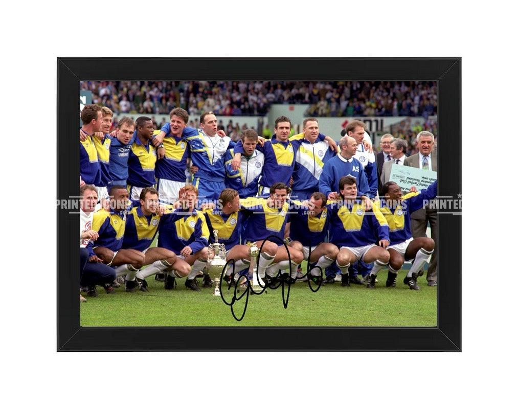 Signed (printed autograph) photo of Gary Speed holding the 1992 First Division Champions trophy for Leeds United.  A printed autograph taken from a genuine, certified (certificate of authenticity)  autograph. A stunning signature. The print is available in a range of sizes with various framing options available. A framed photo version is the perfect gift for any fan.
