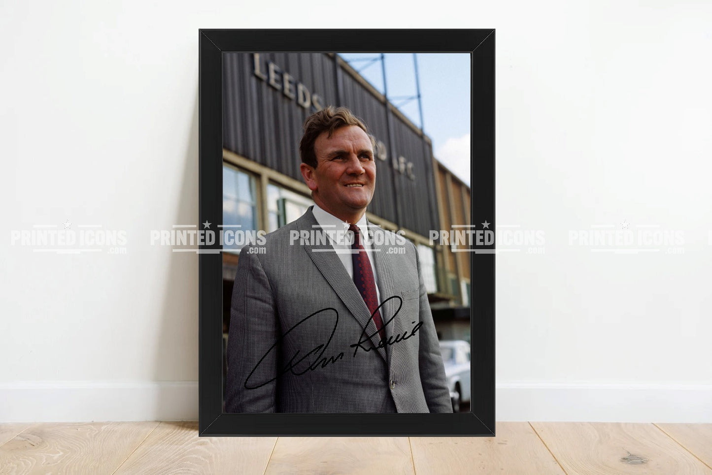 Signed (printed autograph) photo of Don Revie with the 1974 League Cup.  A printed autograph taken from a genuine, certified (certificate of authenticity)  autograph. A stunning signature. The print is available in a range of sizes with various framing options available. A framed photo version is the perfect gift for any fan.