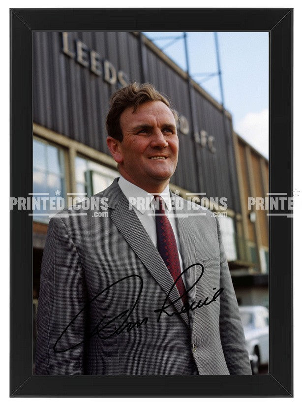 Signed (printed autograph) photo of Don Revie with the 1974 League Cup.  A printed autograph taken from a genuine, certified (certificate of authenticity)  autograph. A stunning signature. The print is available in a range of sizes with various framing options available. A framed photo version is the perfect gift for any fan.