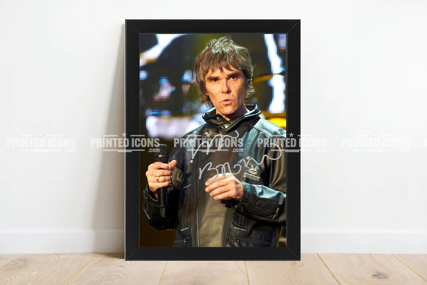 Signed (printed autograph) photo of Ian Brown of The Stone Roses. A printed autograph taken from a genuine, certified (certificate of authenticity)  autograph. A stunning signature. The print is available in a range of sizes with various framing options available. A framed photo version is the perfect gift for any fan.