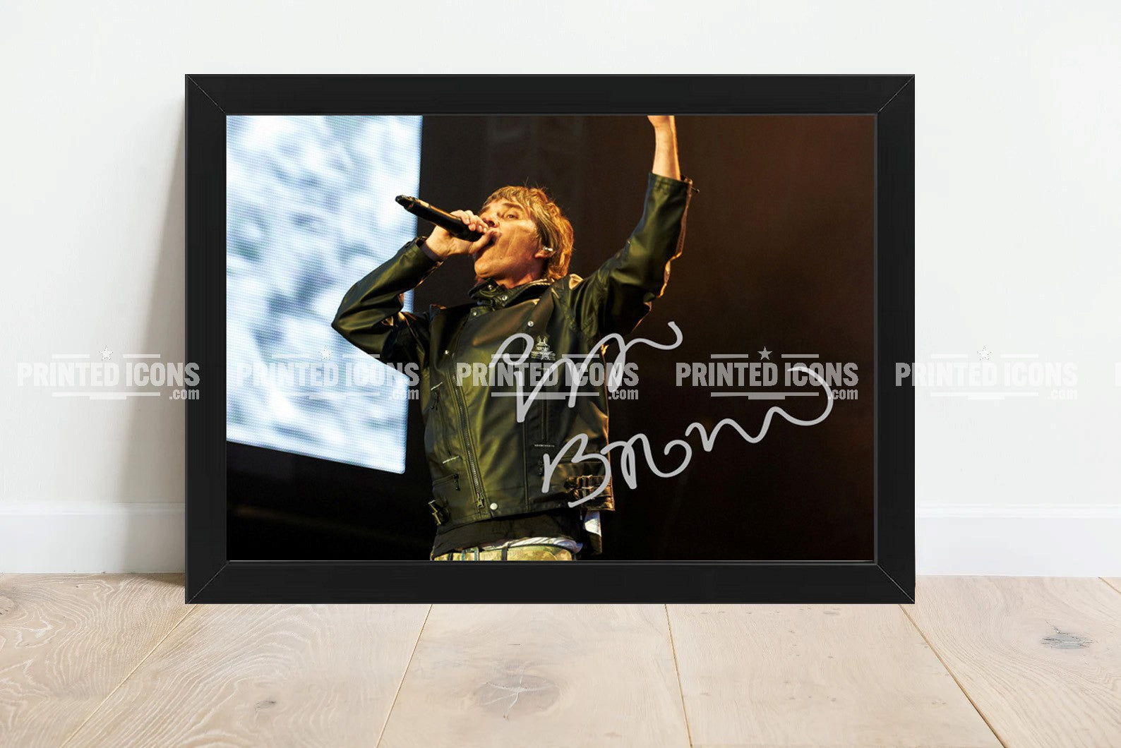 Signed (printed autograph) photo of Ian Brown of The Stone Roses. A printed autograph taken from a genuine, certified (certificate of authenticity)  autograph. A stunning signature. The print is available in a range of sizes with various framing options available. A framed photo version is the perfect gift for any fan.