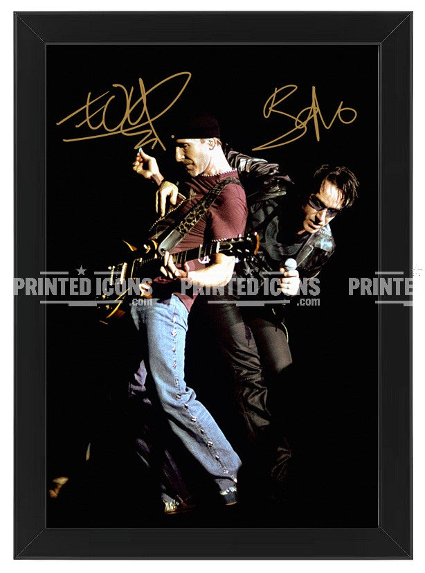 Signed (printed autograph) photo of Bono and The Edge from U2. A printed autograph taken from a genuine, certified (certificate of authenticity)  autograph. A stunning signature. The print is available in a range of sizes with various framing options available. A framed photo version is the perfect gift for any fan.