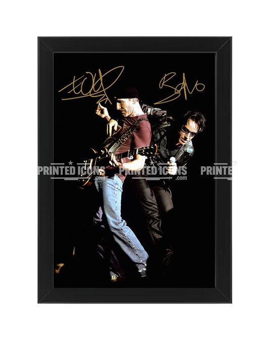 Signed (printed autograph) photo of Bono and The Edge from U2. A printed autograph taken from a genuine, certified (certificate of authenticity)  autograph. A stunning signature. The print is available in a range of sizes with various framing options available. A framed photo version is the perfect gift for any fan.