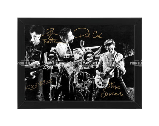 Signed (printed autograph) of The Sex Pistols band. It features the printed autographs of Sid Vicious, Johnny Rotten, Paul Cook and Steve Jones. A printed autograph taken from a genuine, certified (certificate of authenticity)  autograph. A stunning signature. The print is available in a range of sizes with various framing options available. A framed photo version is the perfect gift for any fan.