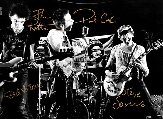 Signed (printed autograph) of The Sex Pistols band. It features the printed autographs of Sid Vicious, Johnny Rotten, Paul Cook and Steve Jones. A printed autograph taken from a genuine, certified (certificate of authenticity)  autograph. A stunning signature. The print is available in a range of sizes with various framing options available. A framed photo version is the perfect gift for any fan.